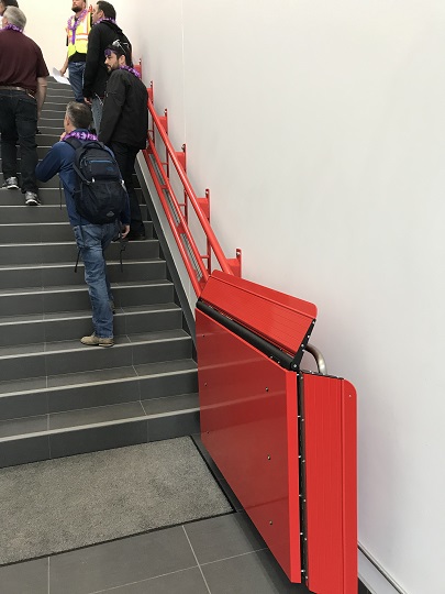 Red Artira Closed At Bottom of Stairs