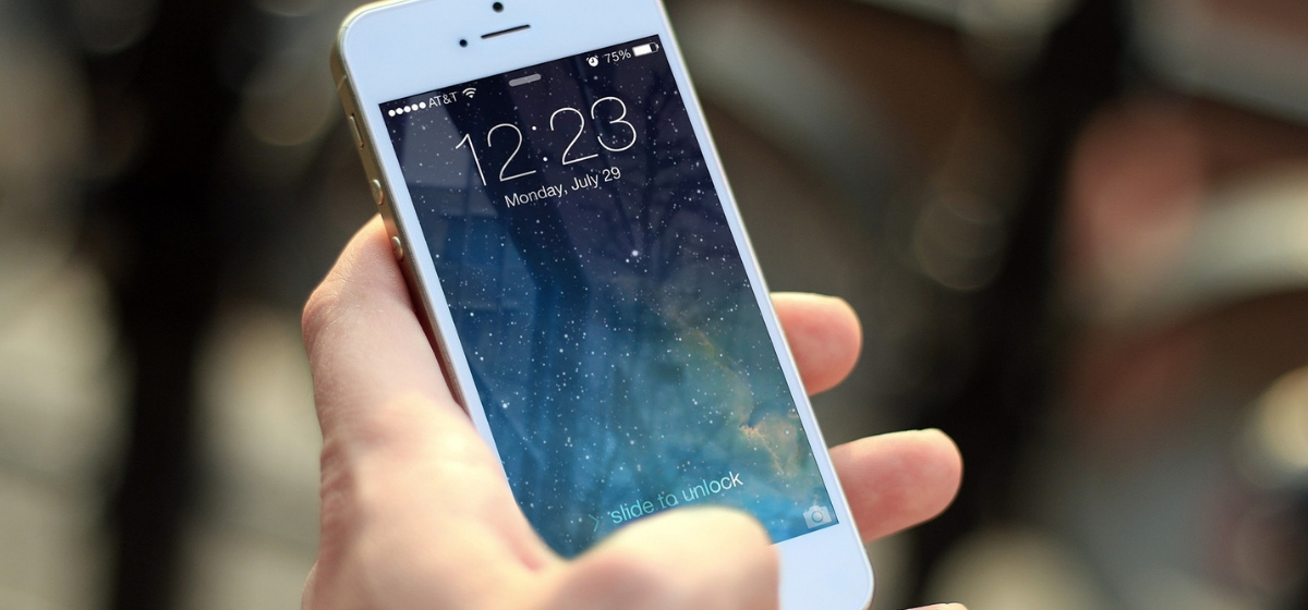 HealthApp_Hero iPhone held by hand